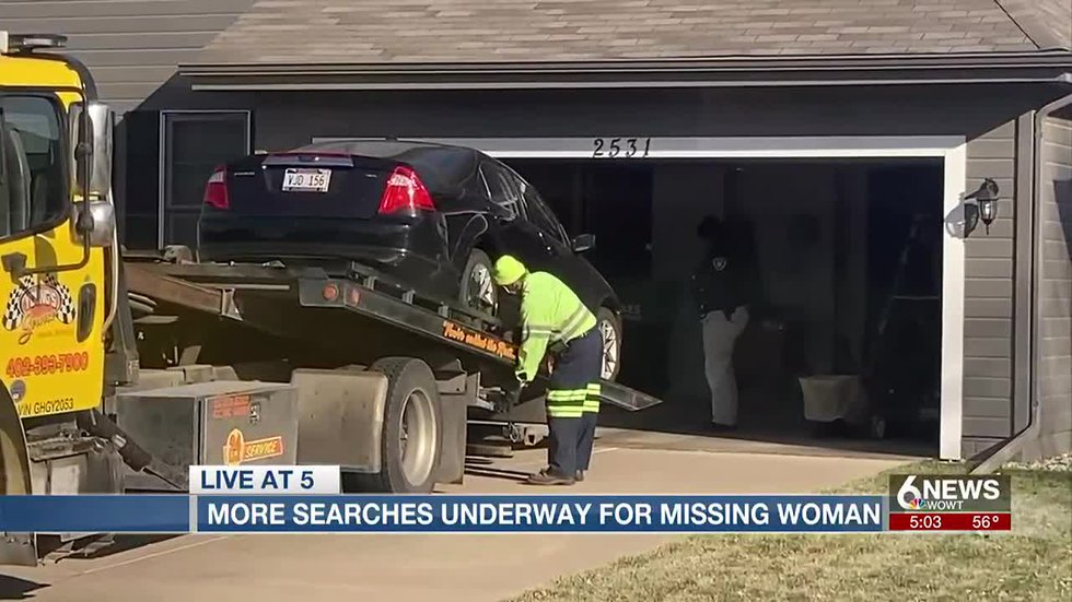 Authorities removed a car from a home in west Omaha while conducting a search for Cari Allen.