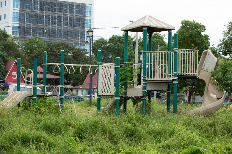 Playground at Petion Square on November 17, 2022. Children once played every Sunday now filled with overgrown weeds and trash. Photo by Marvens Compère for The Haitian Times