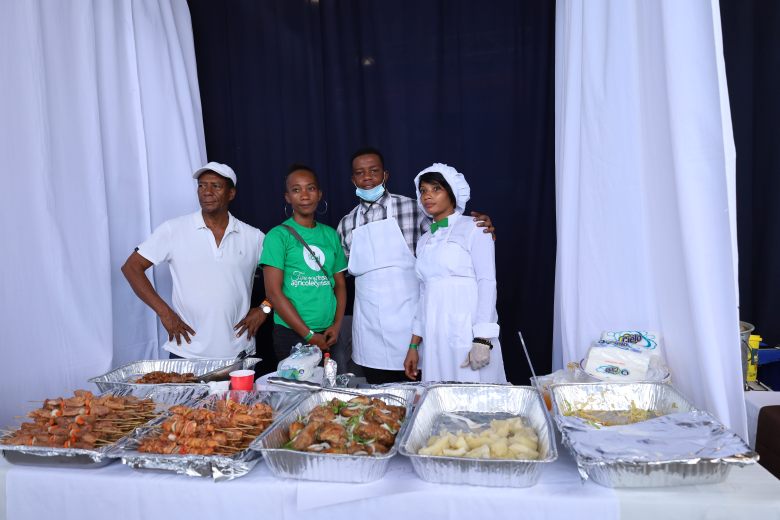 ndors present meat—chicken and goat—served with boiled manioc and pikliz during the first edition of Gwoup Eritaj’s Agricultural and Artisanal Resistance Fair in Pétion-Ville, Port-au-Prince, on May 1, 2025. Photo by Dieugo André for The Haitian Times.