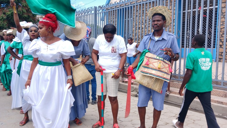 The Jan Datò group performs in the streets of Ouanaminthe for Agriculture and Labor Day celebrations on May 1, 2025. Photo by Edxon Francisque / The Haitian Times.