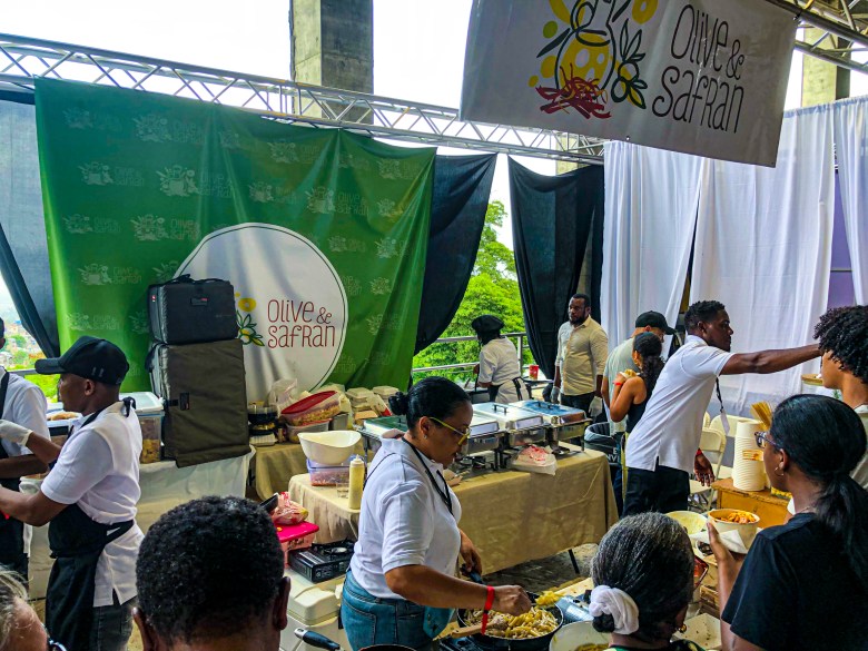 The Olive et Safran food stand, led by several chefs, treated attendees to pasta, cocktails, meat dishes, lemon juice, and a variety of flavorful foods at the first edition of the HAIFEX Women’s Entrepreneurship Fair, held in Pétion-Ville on July 6 and 7, 2025. Photo by Juhakenson Blaise/The Haitian Times