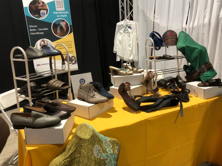 The pieces from the 1804 collection, handmade in Haiti, include shoes, sandals, handbags, and belts for men, women, and children—displayed to visitors at the first edition of the HAIFEX Women’s Entrepreneurship Fair, held in Pétion-Ville on July 6, 2025. Photo by Juhakenson Blaise/The Haitian Times.
