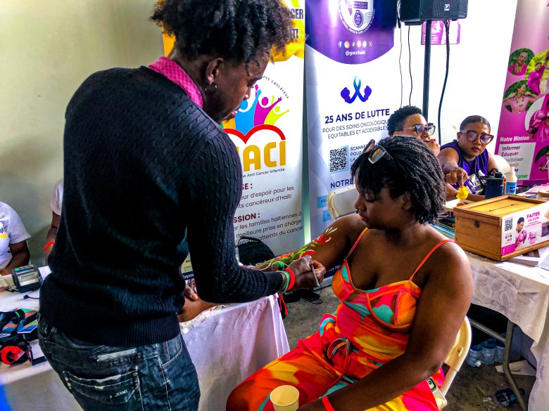 Artists specializing in body painting also made their mark at the first edition of the HAIFEX Women’s Entrepreneurship Fair, held in Pétion-Ville on July 6 and 7, 2025. Photo by Juhakenson Blaise / The Haitian Times