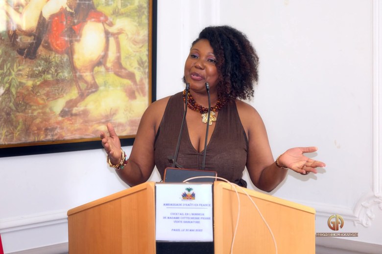 Cottecheese Pierre thanks the attendees at her new book launch signing at the Haitian Embassy in Paris, France, May 29, 2025. Photo by Georges Alexandre and courtesy of Cottecheese Pierre.