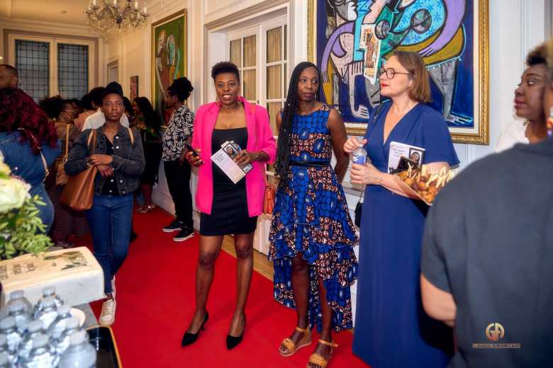 Attendees waiting in line to get their copies signed by Cottecheese Pierre during the Paris book launch at the Haitan Embassy, May 29, 2025. Photo by Georges Alexandre and courtesy of Cottecheese Pierre.
