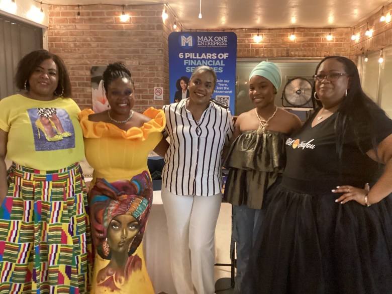 Guest speakers and feminist supporters posing with Cottecheese Pierre; from left to right: Farah Larrieux, Cottecheese Pierre, Darline Délice, singer Tafa Mi-Soleil and Karoll-Ann Fanfan during the Coral Springs signing event at Lotus Mansion, July 27, 2025. Photo by Fritznel D. Octave/The Haitian Times.