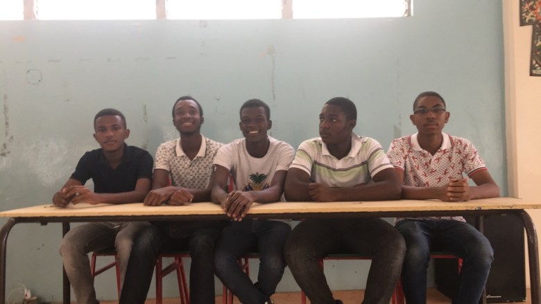 Wilhem Hector and Gil Sander Joseph are pictured on the left, with three other students on their right, during the 2019 interclass genius competition at Institution Saint-Louis de Gonzague in Port-au-Prince. Photo courtesy of Hector and Joseph.