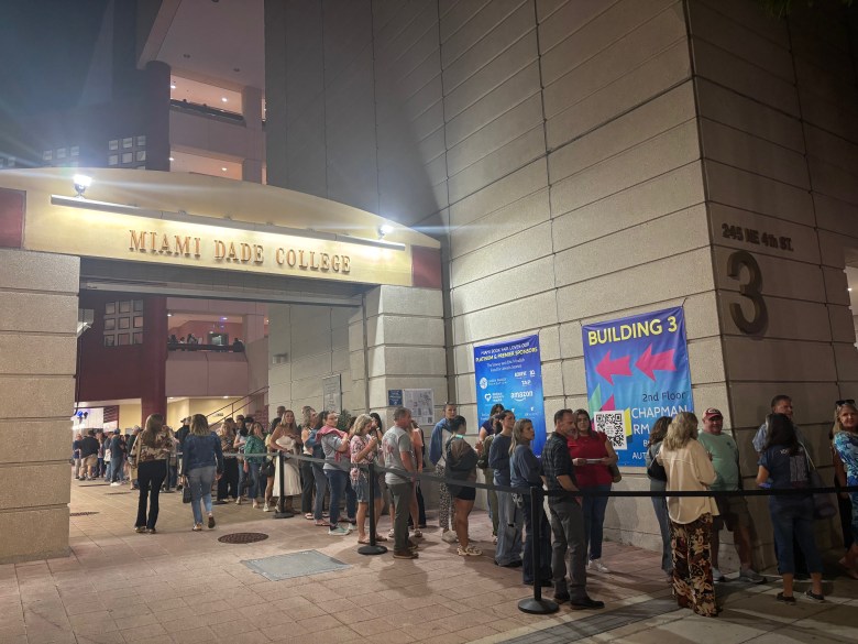 Visitors line up in front of Miami Dade College for an evening conversation between Kenny Chesney and Holly Gleason. The rest of the week will feature panels and conversations with several authors, including Haitian writers. Photo by Béatrice Vallières for the Haitian Times