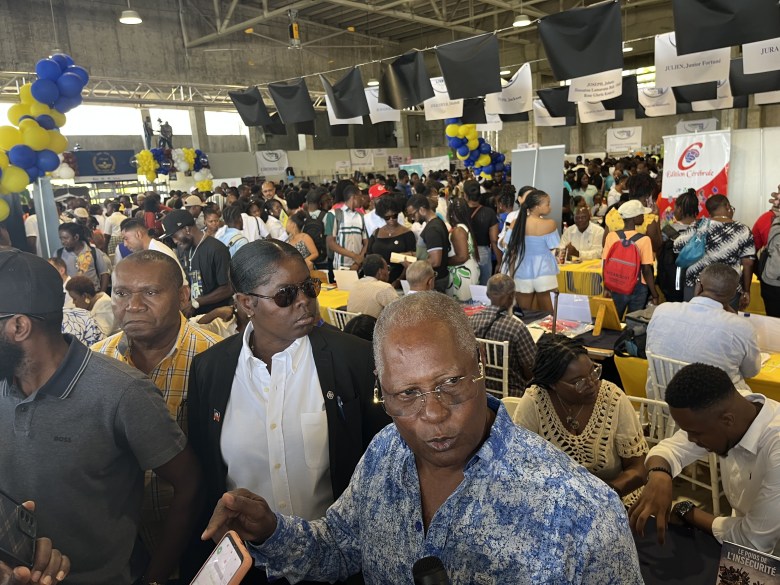 Former provisional president of Haiti Jocelerme Privert is seen at the 32nd edition of Livres en Folie at the El Rancho Hotel in Pétion-Ville on Thursday, June 4, 2026. Photo by Juhakenson Blaise / The Haitian Times
