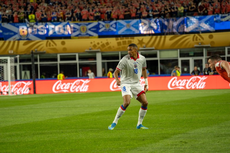 Wilson Isidor (18) of Les Grenadiers tracks the play during Haiti’s Group C match against Scotland at the 2026 FIFA World Cup at Gillette Stadium in Foxborough, Massachusetts, on June 13, 2026. Photo by Fredner Cayemitte / The Haitian Times.