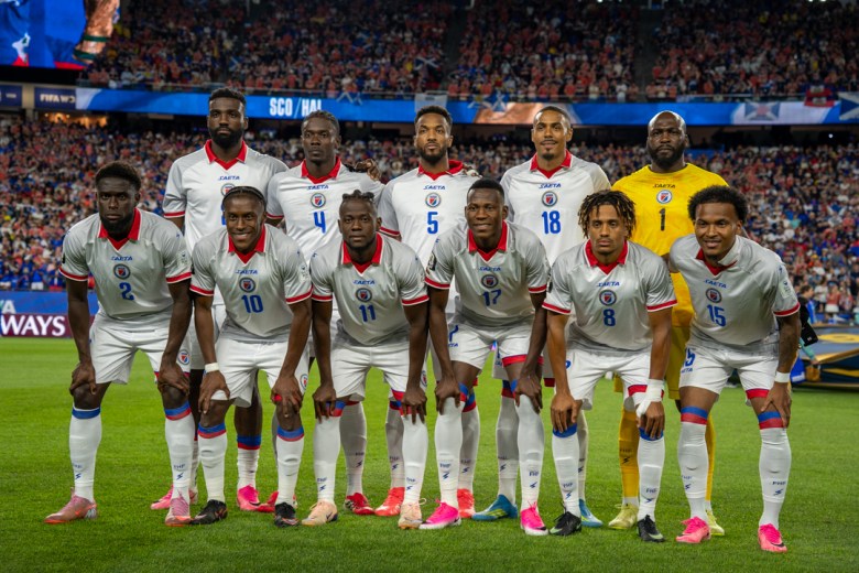 Les Grenadiers pose for a team photo before Haiti’s Group C match against Scotland at the 2026 FIFA World Cup at Gillette Stadium in Foxborough, Massachusetts, on June 13, 2026. Photo by Fredner Cayemitte / The Haitian Times.