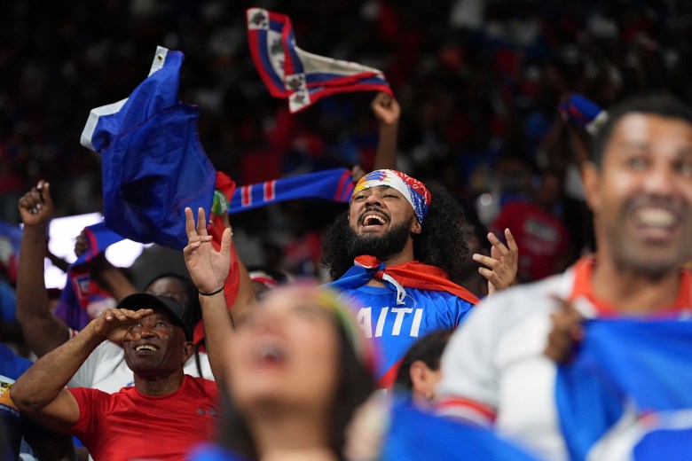 Haiti fans cheer during the second half of an international friendly soccer match against Peru, Friday, June 5, 2026, in Miami. (AP Photo/Rebecca Blackwell)