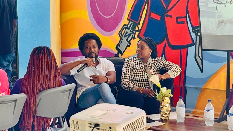 L-R: Sociologist James Beltis and political scientist and activist Stéphanie Sophie Louis speak during the Nègès Mawon commemoration honoring Antoinette “Netty” Duclaire on June 29, 2026, in Port-au-Prince. Photo by Juhakenson Blaise/The Haitian Times.