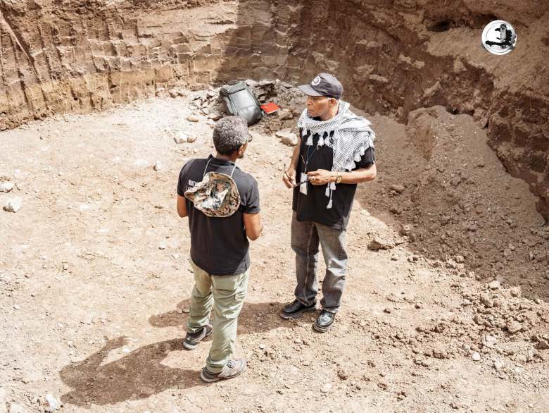 The National Bureau of Ethnology (BNE) team along with local officials and leaders during the archeological visit to view the artifacts found underneath the Conservative Baptist Church in Grande-Rivière-du-Nord on Thursday, July 16, 2026. Photo via BNE’s Facebook page